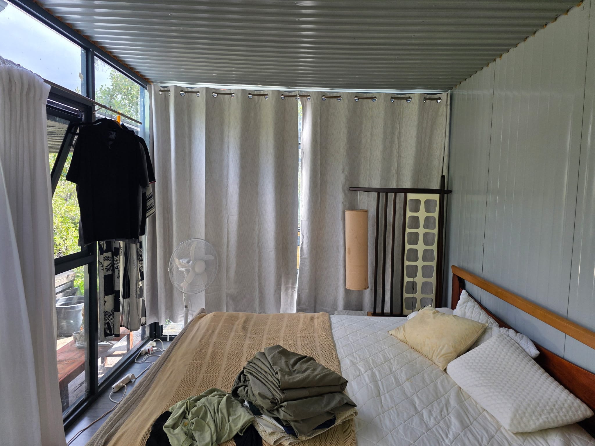 Guest room portable pod set up as a bedroom