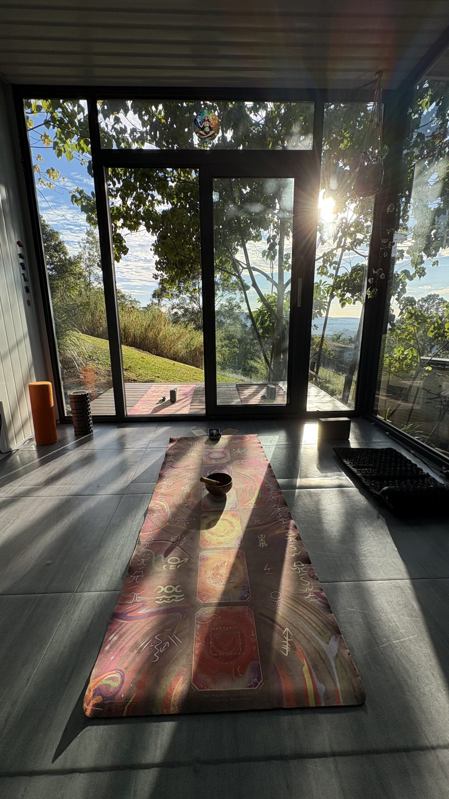 Yoga studio inside a glass portable pod